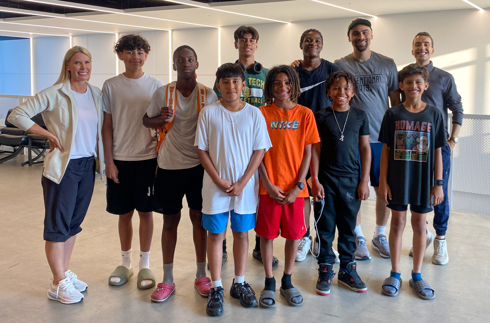 Athletes from the pilot program with Intentional Sports gathered in a circle in Chicago